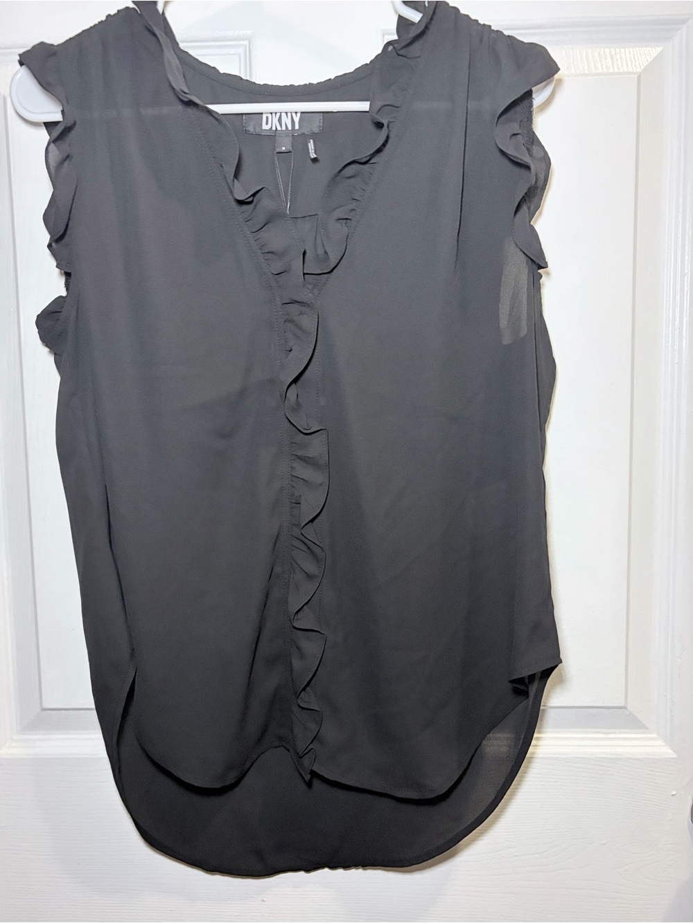 Black DKNY sleeveless blouse
